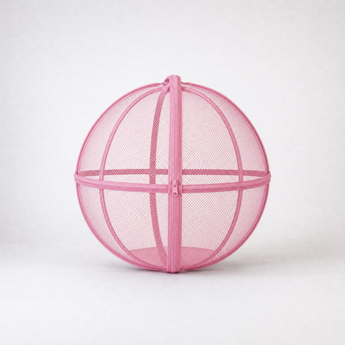 Pink rounded mesh cat playpen with a zippered opening