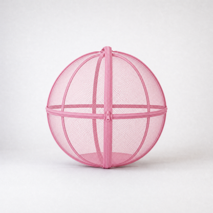 Pink rounded mesh cat playpen with a zippered opening