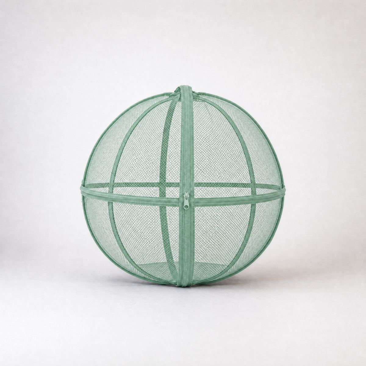 Green rounded mesh cat playpen with a zippered opening